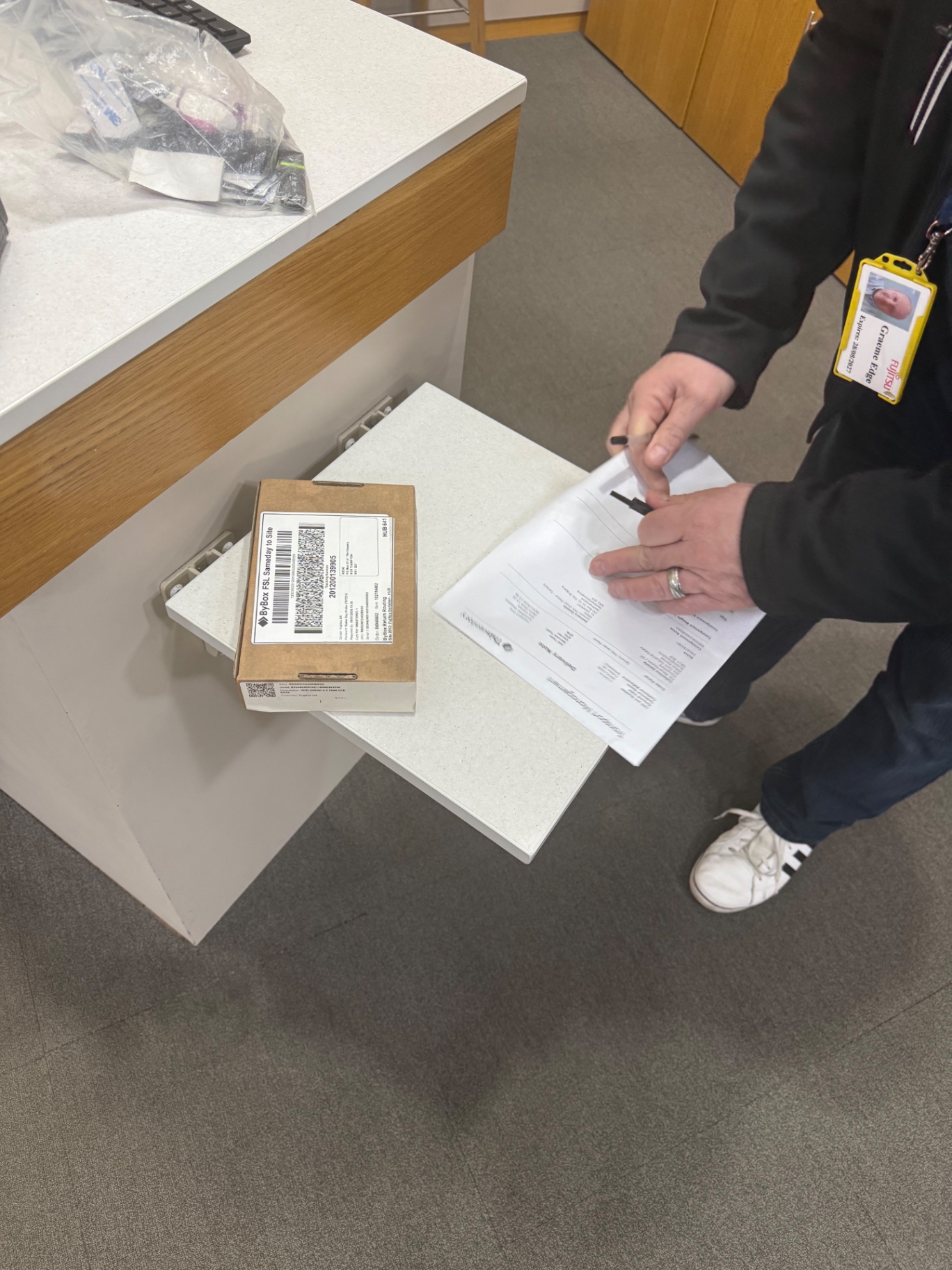 Delivery paperwork being signed on site